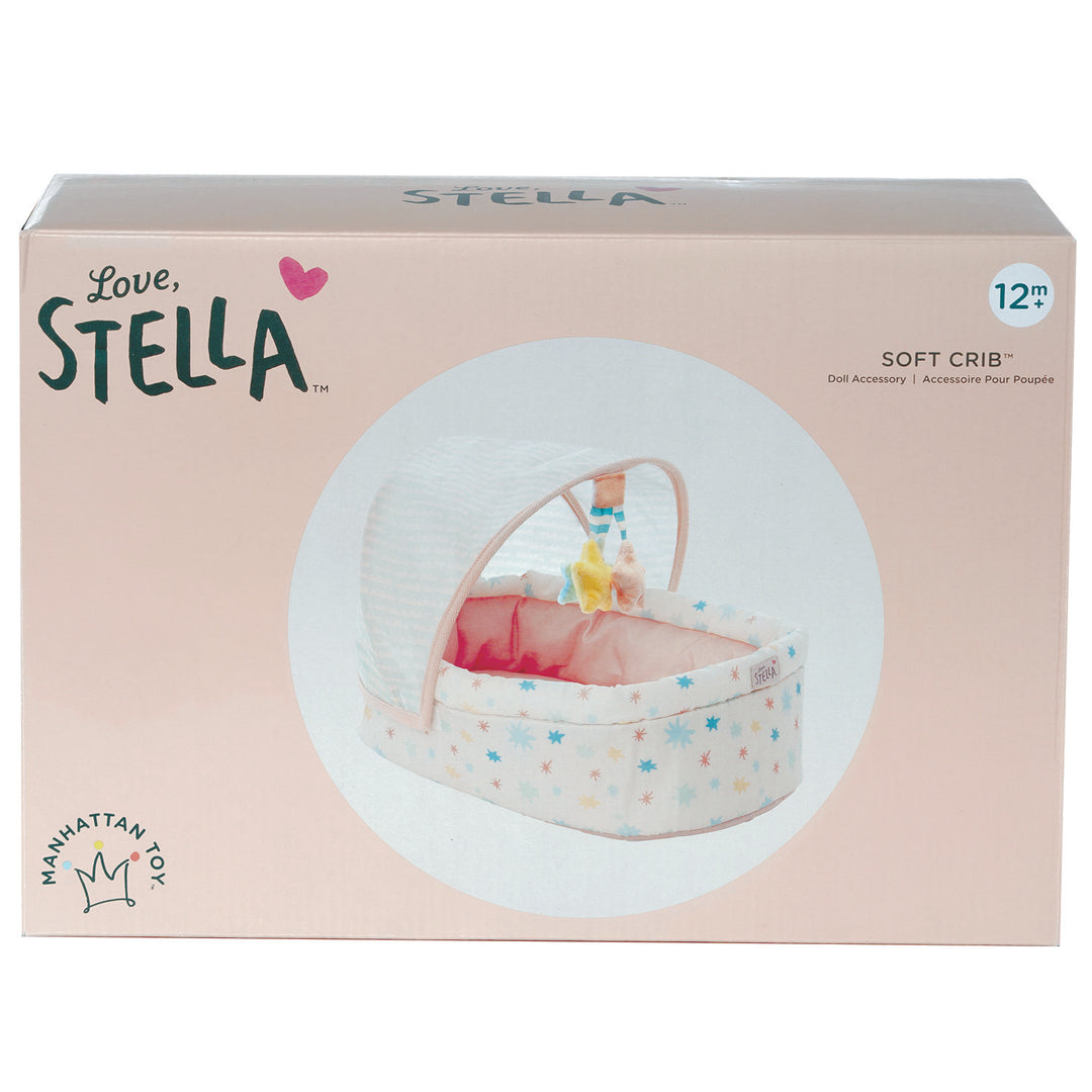 soft baby doll crib with removable hanging mobile and canopy pictured in box retail packaging