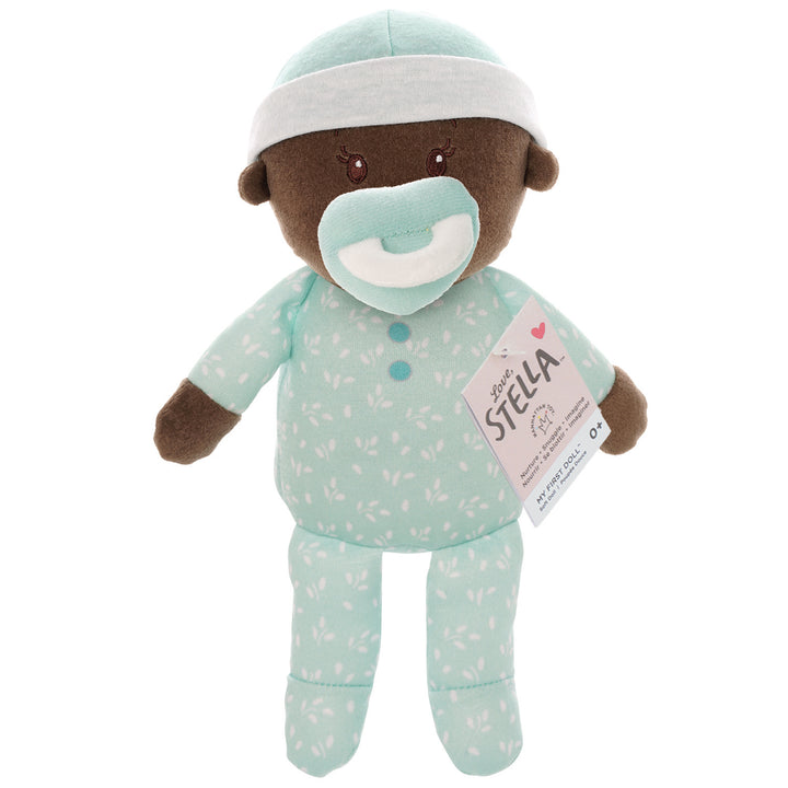 soft baby snuggle doll with brown skin with magnetic pacifier pictured with hang tag packaging