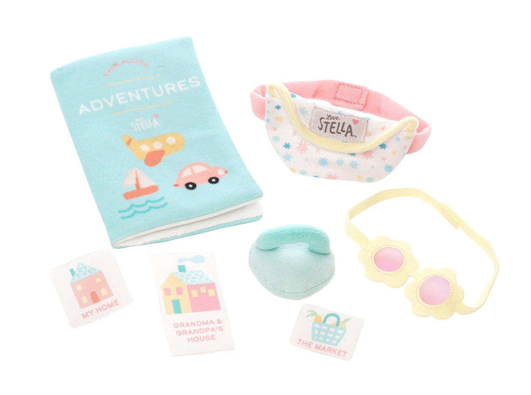 travel themed doll accessory set with doll sized fanny pack and sunglasses along with a child sized travel book with 6 stamps 