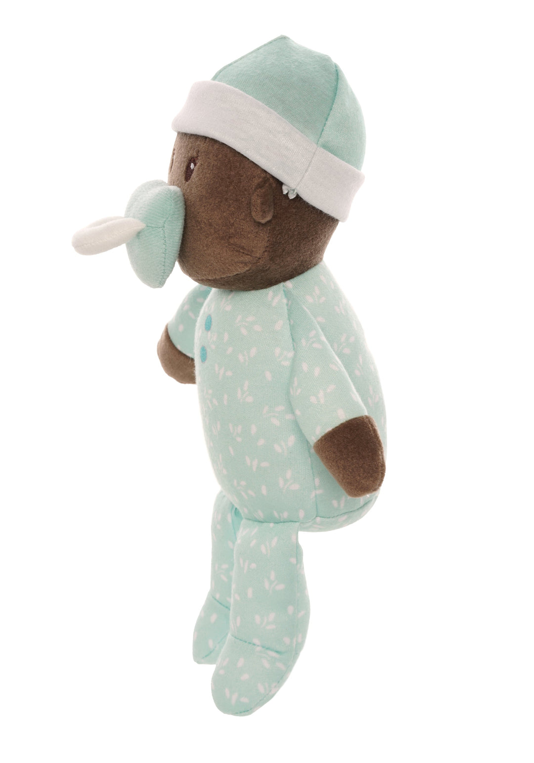 soft baby snuggle doll with brown skin that includes a magnetic pacifier 