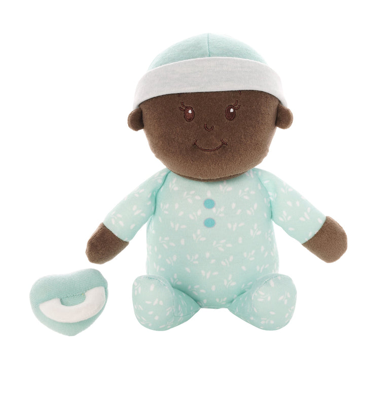 soft baby snuggle doll with brown skin that includes a magnetic pacifier 